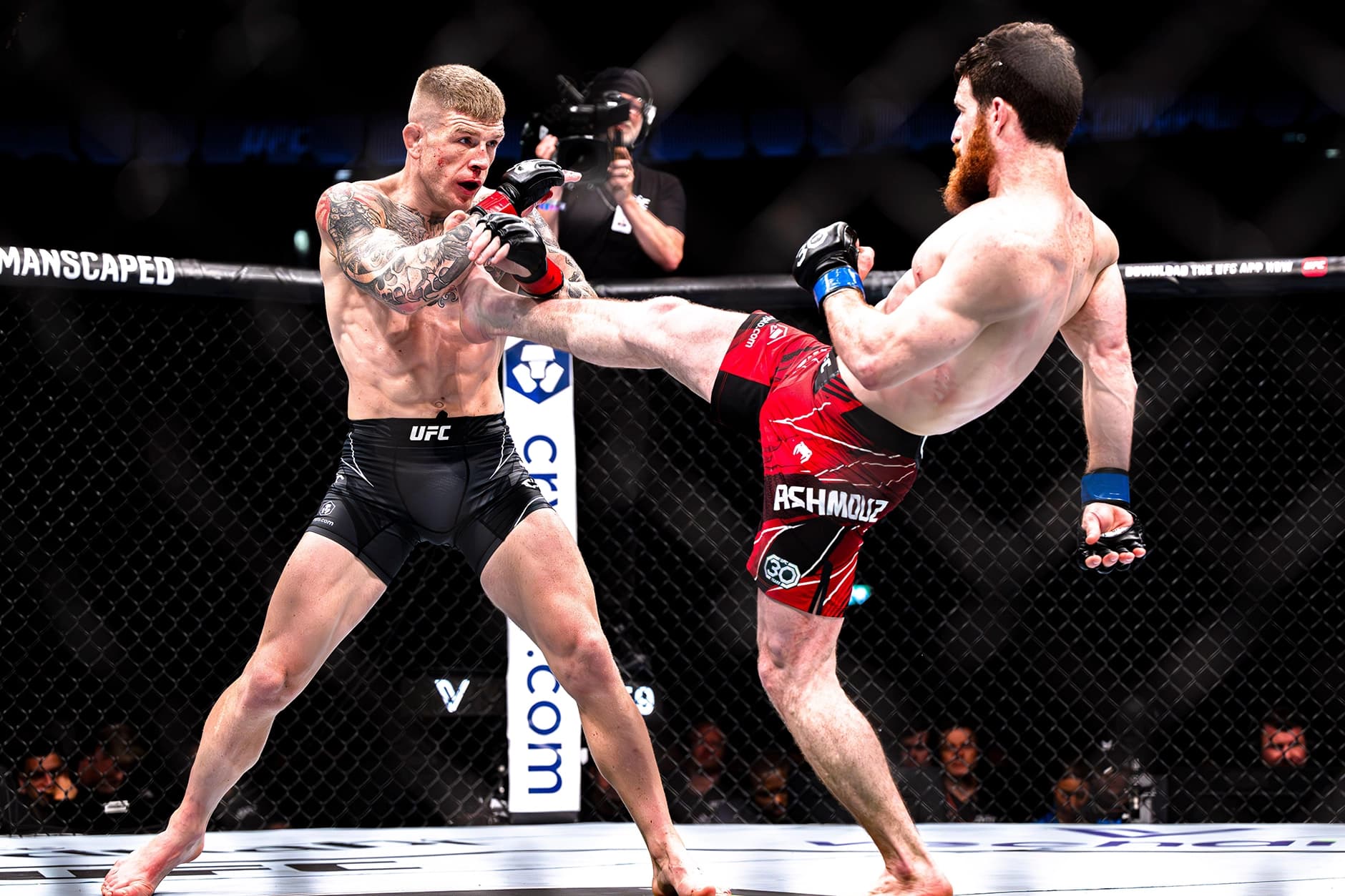 A golf ball with a fitleist logo on it about to enter the hole