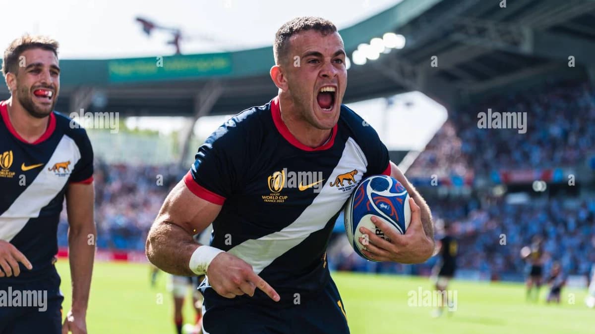 Rugby union stadium packed crowd with pitch-side sports advertising and kit sponsorship - World Sports Advertising