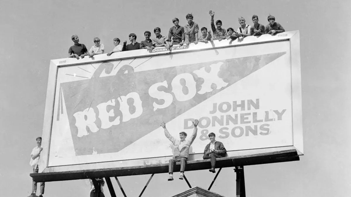 The History of Sports Advertising: From Stadium Signs to Global Partnerships