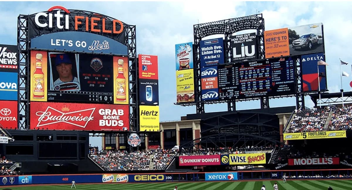 What are the responsibilities of a sports marketer working in advertising?