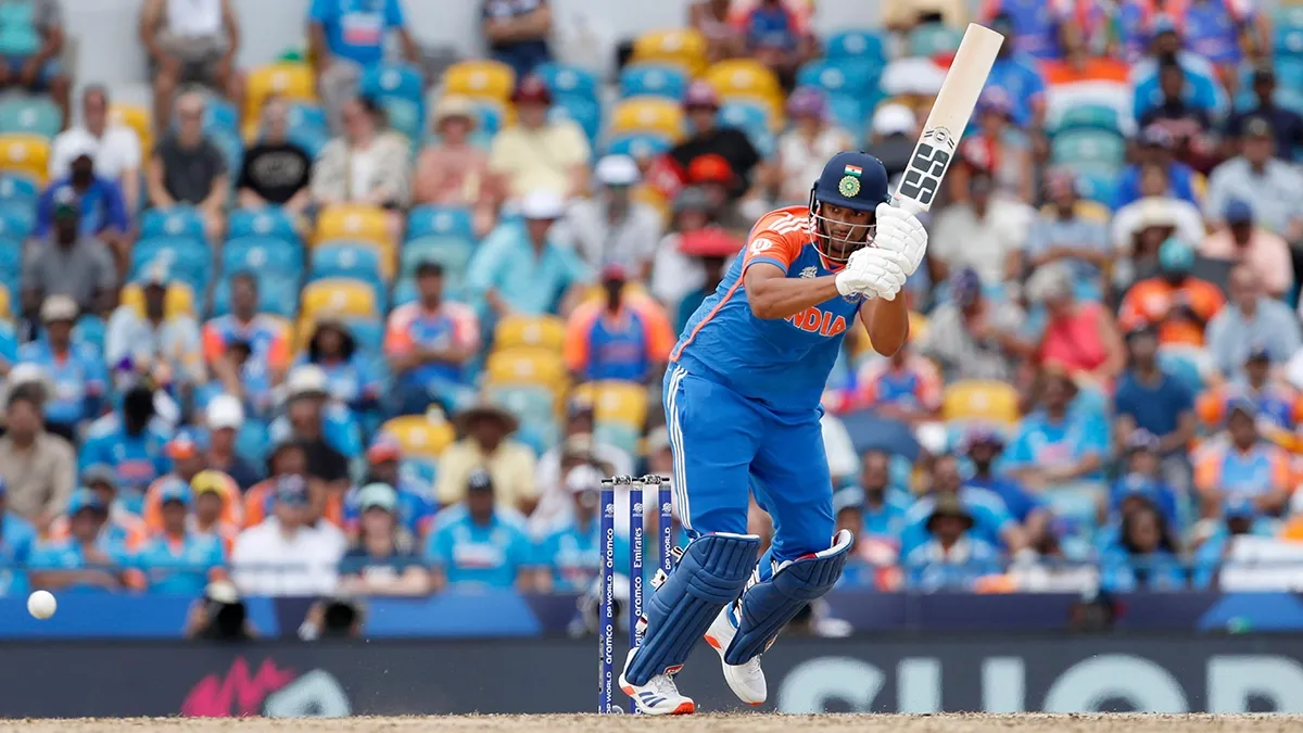 T20 World Cup cricket match with stadium sports advertising and fan crowd - World Sports Advertising