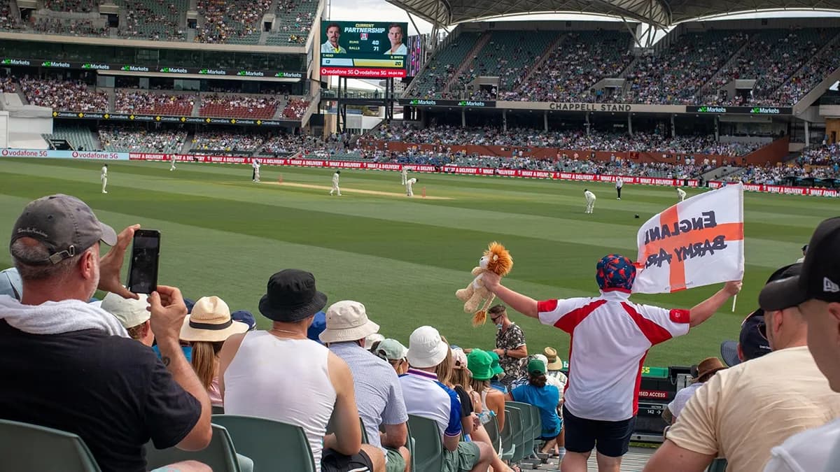 Cricket stadium crowd during an international match with sports sponsorship boards - World Sports Advertising