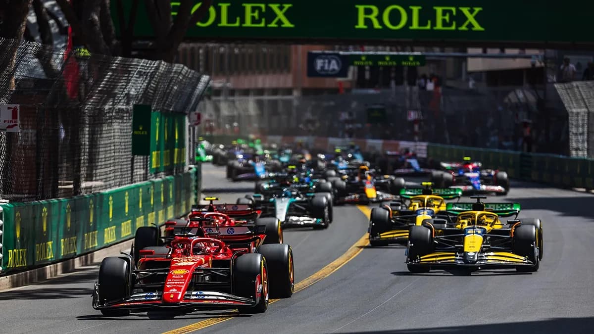 Formula 1 race with car livery sponsorship and trackside sports advertising - World Sports Advertising
